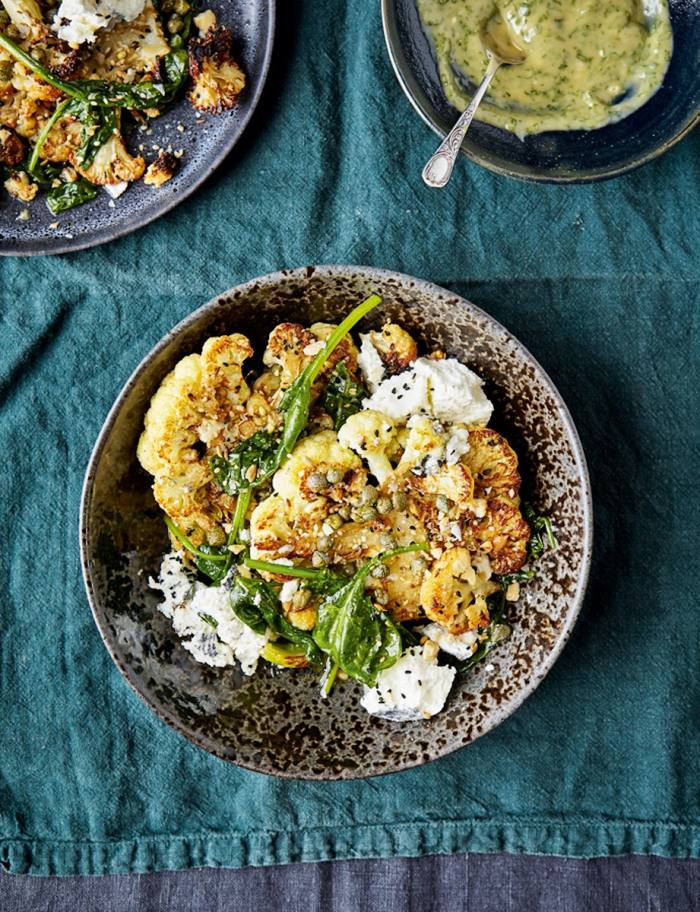 Cauliflower “steak” with green tahini, spinach, capers and curd from Eve Kalinik’s book Happy Gut, Happy Mind (Little, Brown, £25)