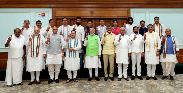 Narendra Modi with NDA party leaders on Wednesday. N Chandrababu Naidu stands directly on the prime minister’s left, with Nitesh Kumar next to Naidu.
