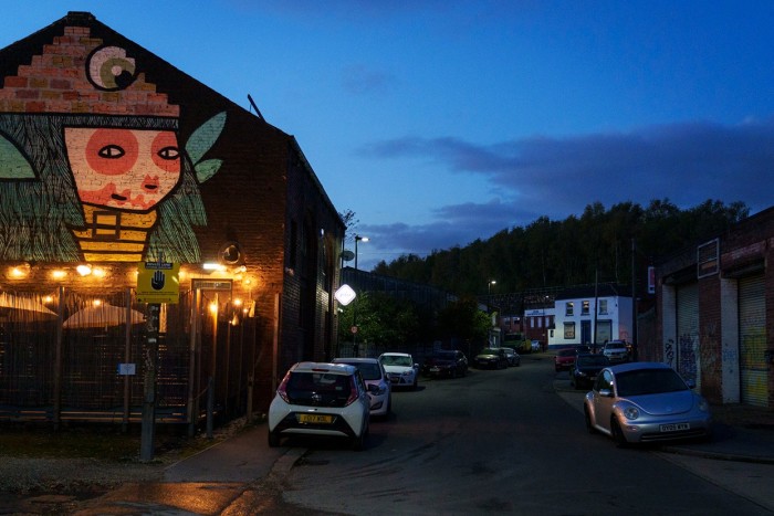 Several cars are parked outside a former warehouse turned Mexican restaurant in Sheffield