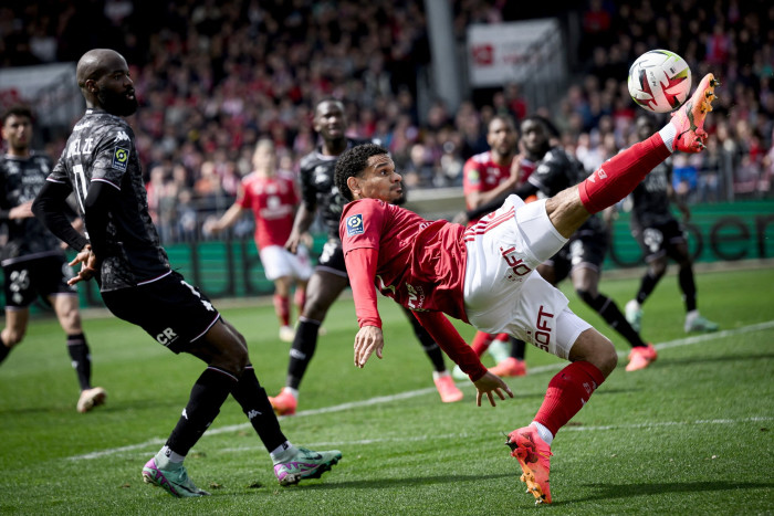 Brest’s French defender Kenny Lala, right, attempts a bicycle kick during the French L1 football match between Stade Brestois 29 (Brest) and FC Metz at Stade Francis-Le Ble