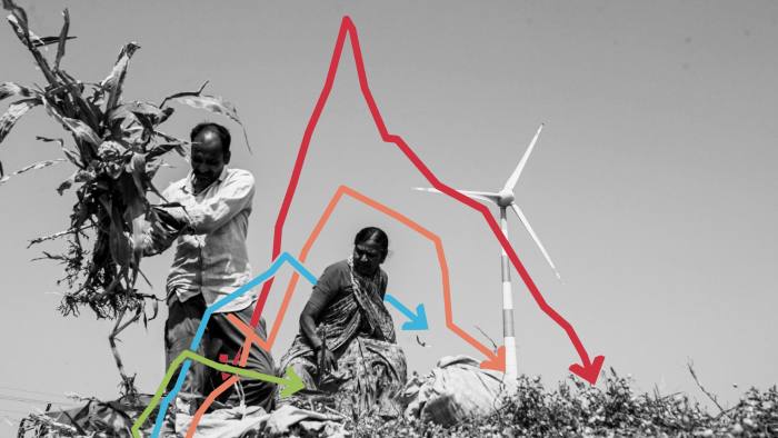 Workers at a wind farm in Hubli, Karnataka, India, in February