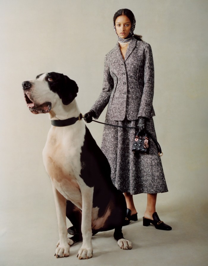 Dior tweed jacket, £3,300, matching skirt, £3,600, silk twill Oblique scarf, £360, and lambskin Lady Dior Micro bag, £2,500. Hermès leather Diane mules, £790. Gloves, stylist’s own