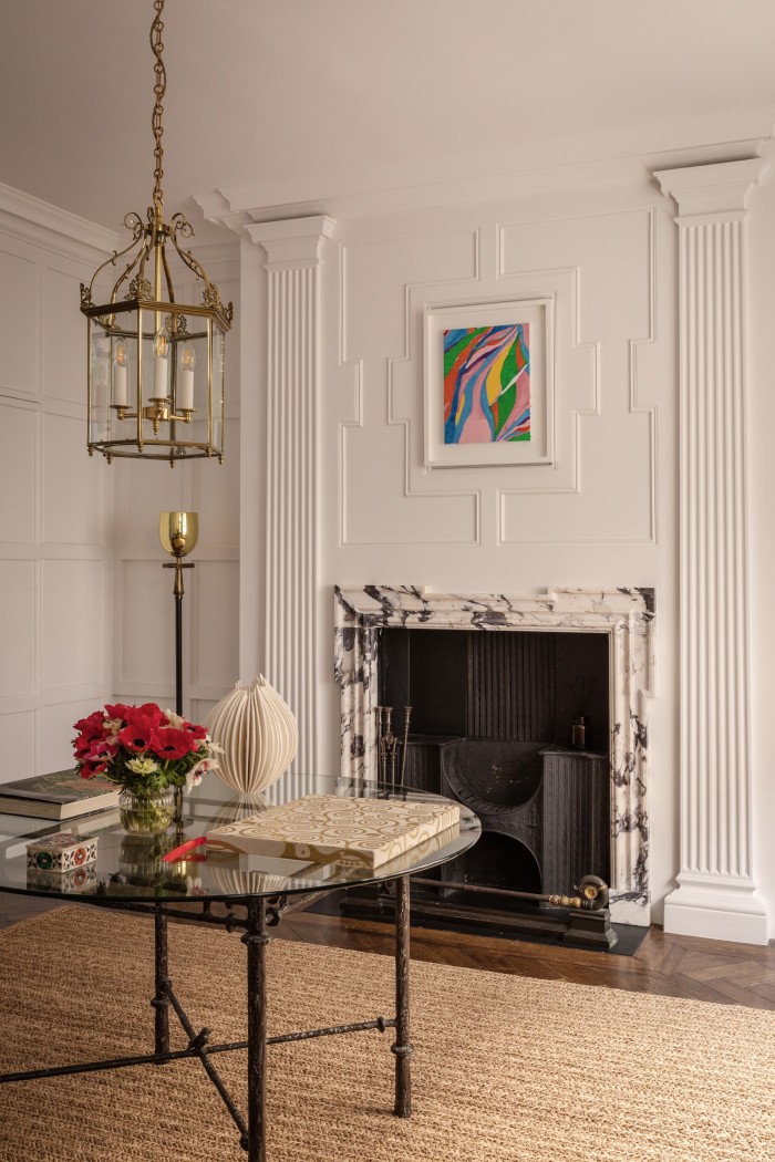 The entrance hall. From left: a Paul Smith bronze centre table, Regency lantern, ceramic vase by Yuki Nara from Gallery Nisoproject and a painting by Samuel de Gunzburg