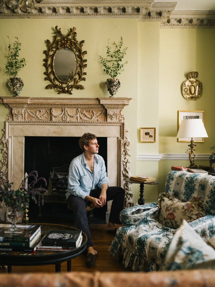 Interior designer Remy Renzullo in the drawing room at his home in Islington
