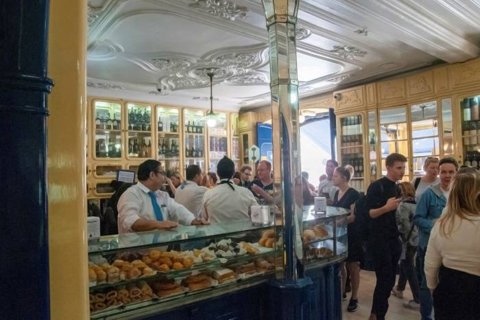 A queue for traditional pasteis de nata at Lisbon’s renowned Antiga Confeitaria de Belém