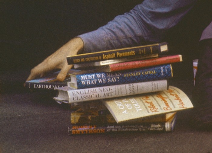 Film still from ‘Bob with Books’ (1971) by Nancy Holt