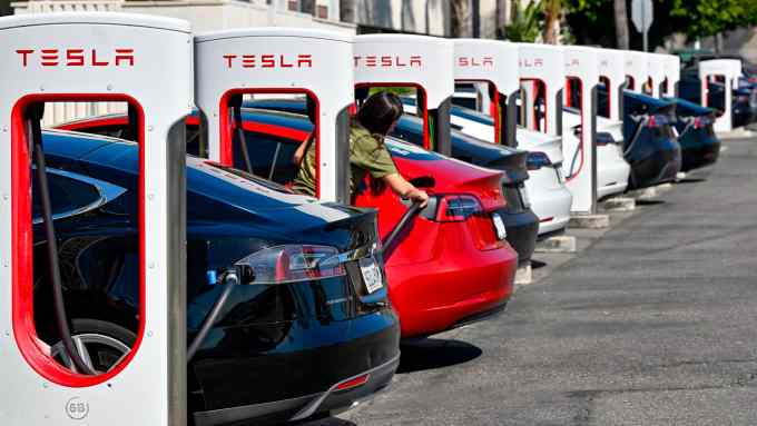 A row of Teslas being charged in Santa Ana, California