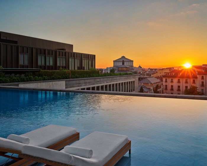 The hotel’s rooftop pool at sunset