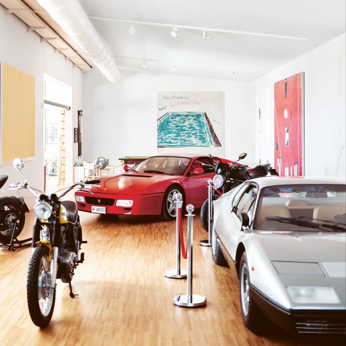 Art, cars and motorbikes in the converted barn, where guests can also work out in the gym