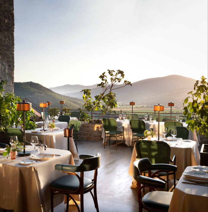 Tables on the castle’s terrace offer spectacular views of the Umbrian countryside