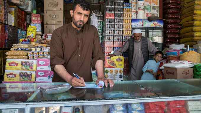 Shopkeeper Rajab Ali Yousefi