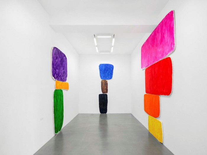 Brightly coloured patches on white walls
