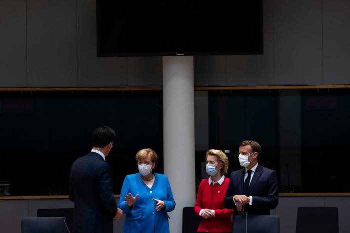 (From left) Netherlands prime minister Mark Rutte; German chancellor Angela Merkel; president of the European Commission Ursula von der Leyen; and France’s President Emmanuel Macron at an EU summit on July 18. “We were facing the risk of a crisis that could blow up the European Union,” says Johannes Hahn, the EU’s budget commissioner