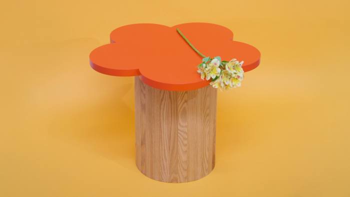 The orange and flower-shaped Billy Furniture Willow side table
