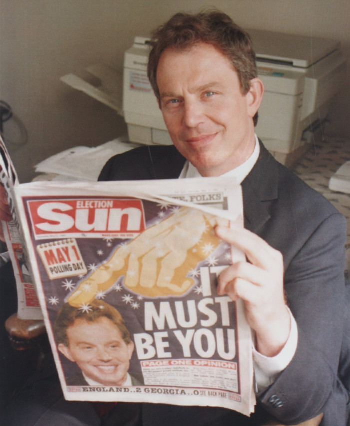 Former prime minister Tony Blair holding a copy of the Sun’s election day special in 199