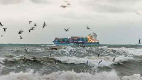 Choppy seas: a container ship at anchor off the Irish coast