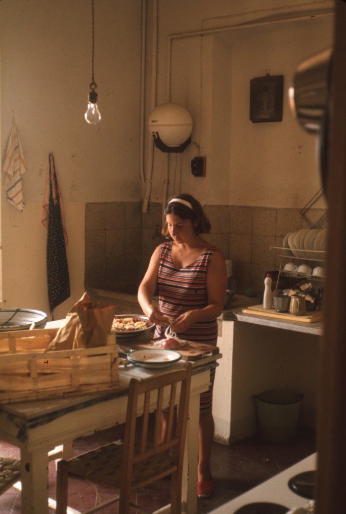 Betty Woodman preparing a summer meal in Italy, c1966