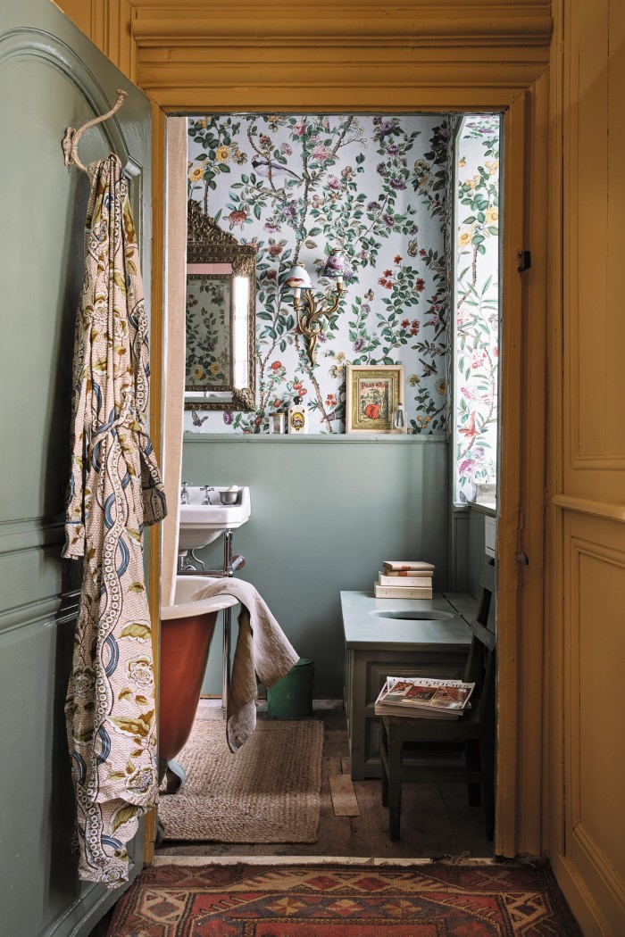 The bathroom, with wallpaper in Antoinette Poisson Canton, €160 a roll