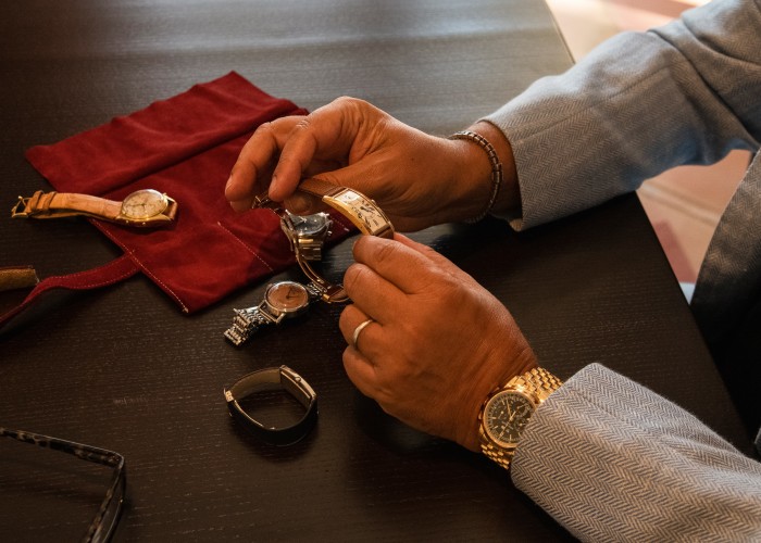 Davide Parmegiani handles some of his collection of watches