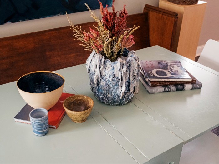 Ceramics and art books on Bell Brown’s coffee table