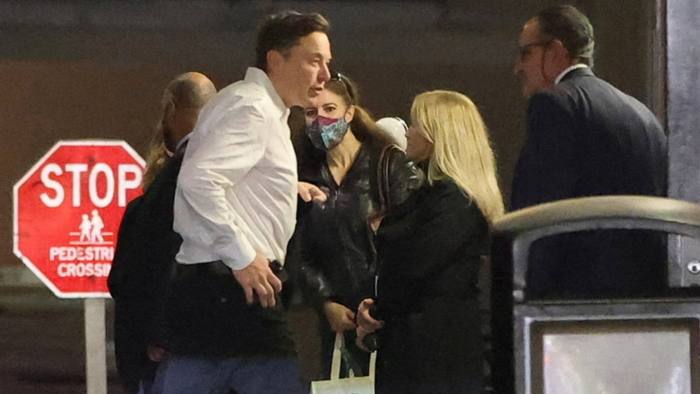 Elon Musk pictured arrives at a conference in Manhattan on Friday