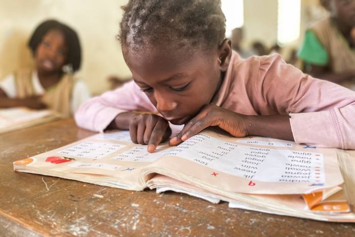 Pupils practise reading in their local language