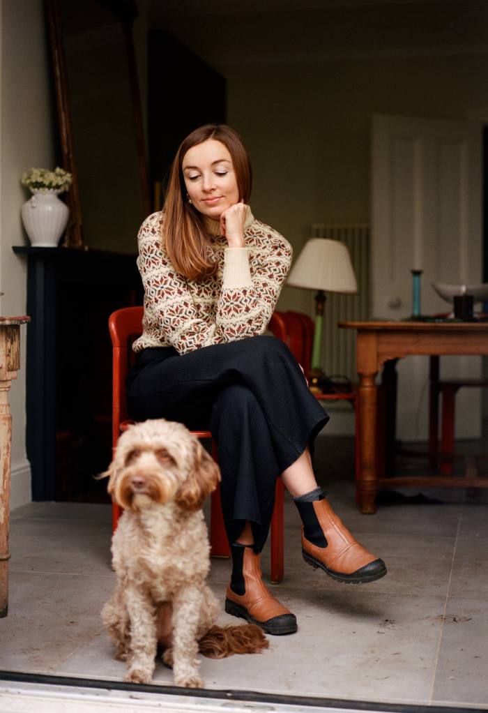 Lauren, pictured with her dog, Piper, wears vintage Fair Isle jumper (bought at Chiswick flea market), Rachel Comey cotton trousers, Falke Cosy Wool socks, £18, and boots by Loewe. Unless otherwise stated, all items are Lauren’s own
