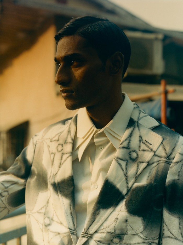 Bharath wears Louis Vuitton GOTS organic viscose jacket, £2,500, and cotton knotted collar shirt, £790
