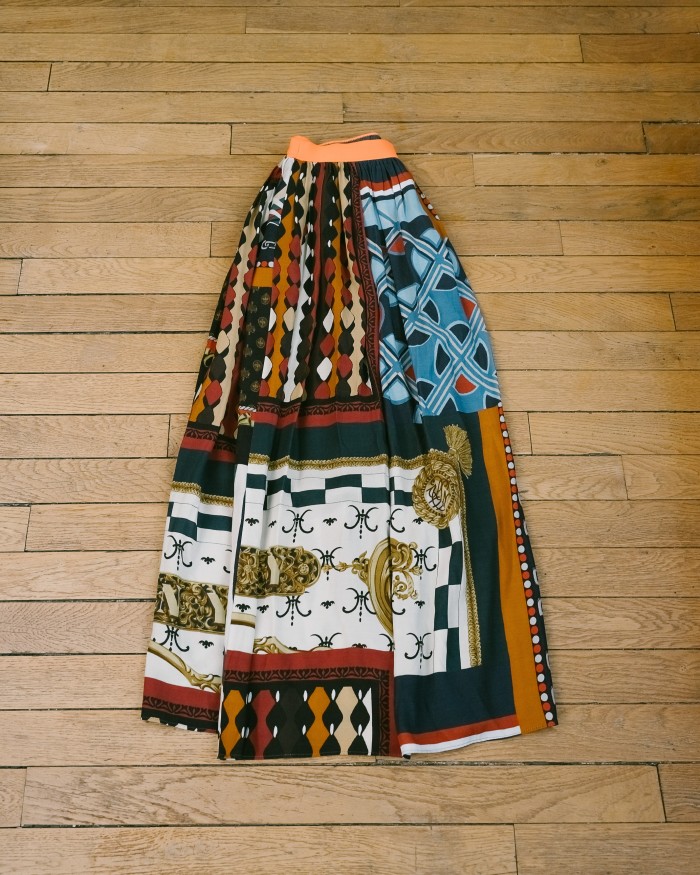 Her skirt by Japanese label Kolor