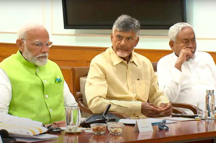 A video uploaded on the official YouTube channel of Narendra Modi, the prime minister, left, is sitting next to Telugu Desam Party leader N Chandrababu Naidu, center, and Janata Dal (United) leader Nitish Kumar during a meeting at the prime minister’s residence in New Delhi, India