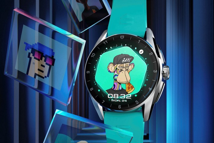 An illustration of a monkey wearing a hat and biting on a pizza slice is on a watchface