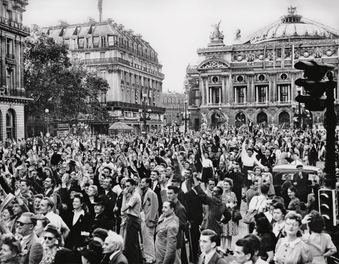 Paris on VE Day in 1945, by Robert Capa