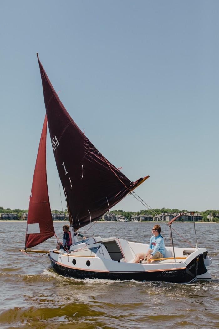 Greeley and his son Clyde on the Severn River, in Maryland 