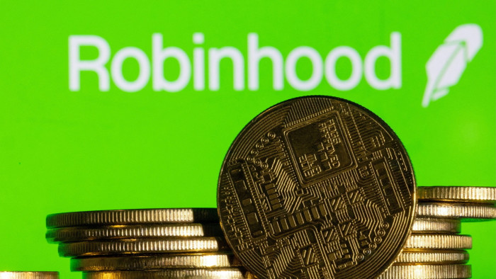 Robinhood logo and representations of cryptocurrency