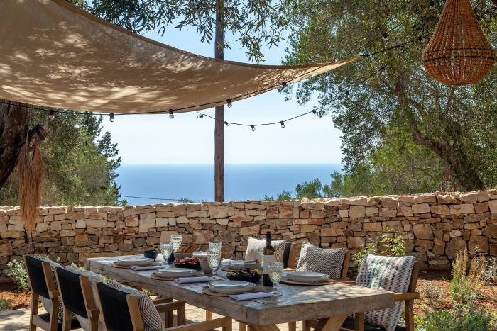 Outdoor dining at one of The Thinking Traveller’s rentals on Paxos