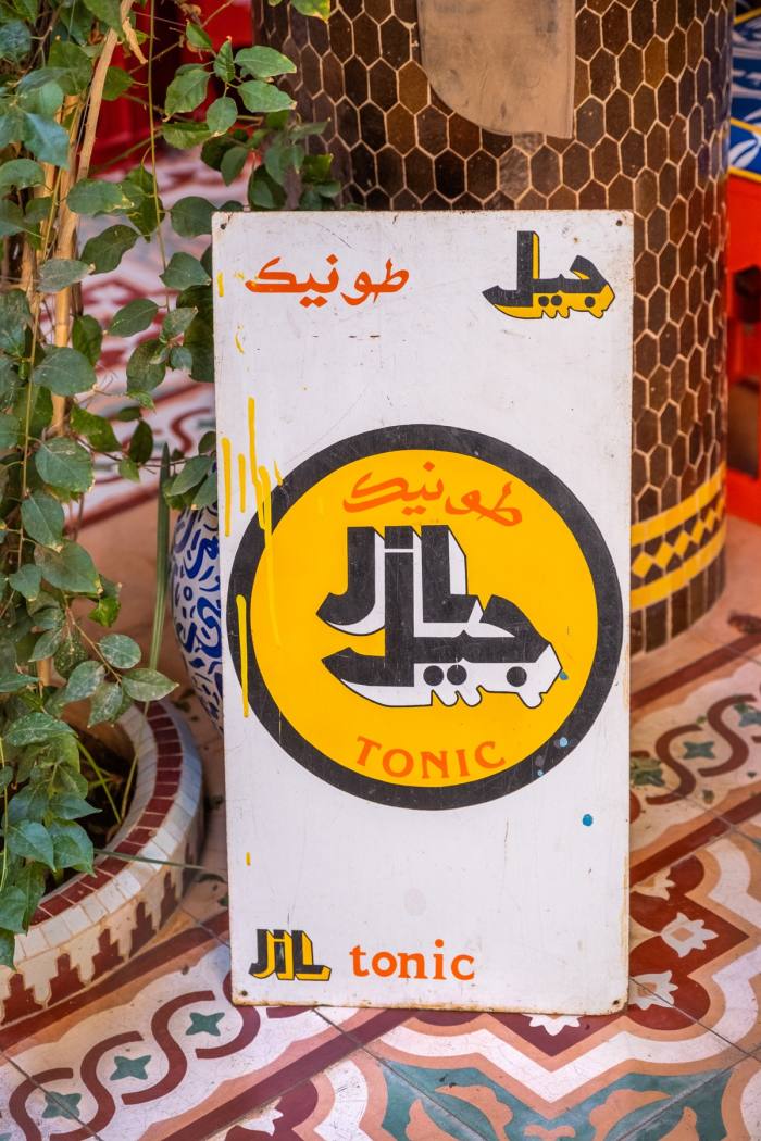 A sign from Hajjaj’s 3,000-piece collection of Arabic memorabilia and paraphernalia