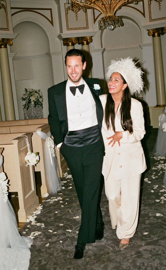 Amrit Tietz and Jon Tietz marry in Las Vegas. She wears a vintage suit from Happy Isles