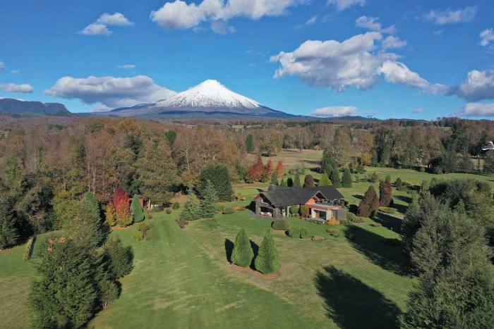Casa Pucón in Chilean Patagonia’s Lake District, with Villarrica volcano behind