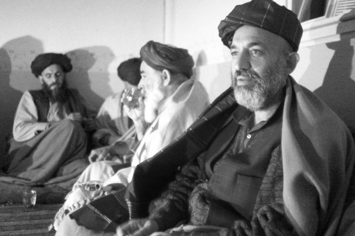 Hamid Karzai meets tribal leaders in Kandahar, Afghanistan, in 2001