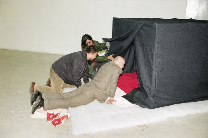 Ai Weiwei and Uli Sigg pictured together in 2000 at the Fuck Off exhibition, Shanghai