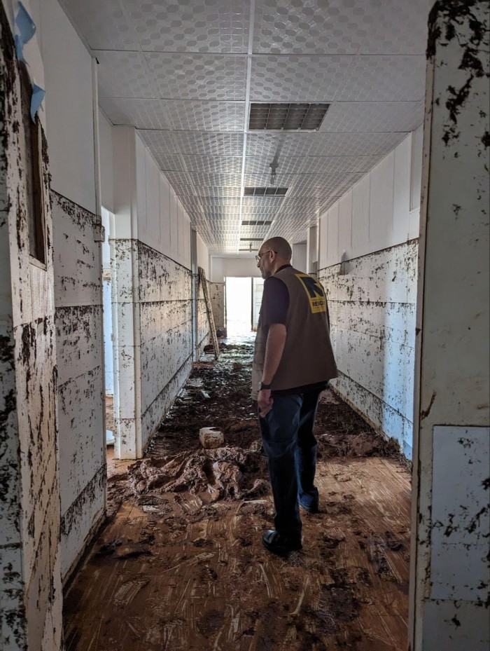 International Rescue Committee Libya country director Elie Abouaoun inspects damage at the Bayada Primary Health Care Centre after Storm Daniel