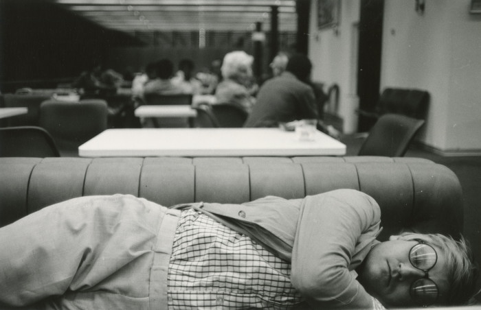 David Hockney asleep in the Transit Lounge at Dubai Airport, 1977
