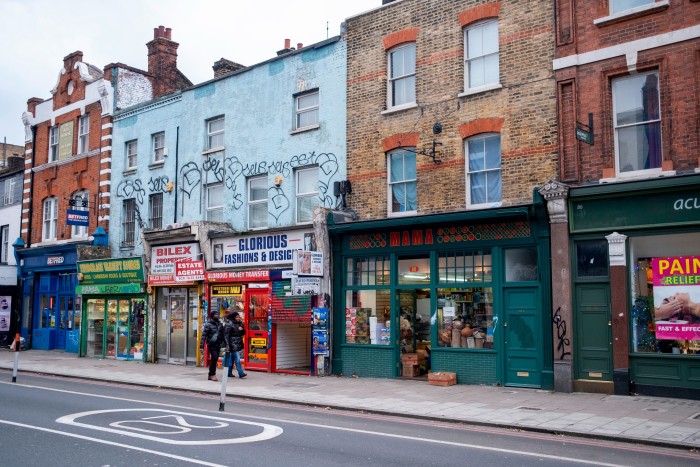 A photo of shop fronts along Peckham High Street, London