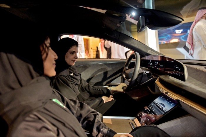 A picture from last year of two women in an electric car in the Red Sea port of Jeddah