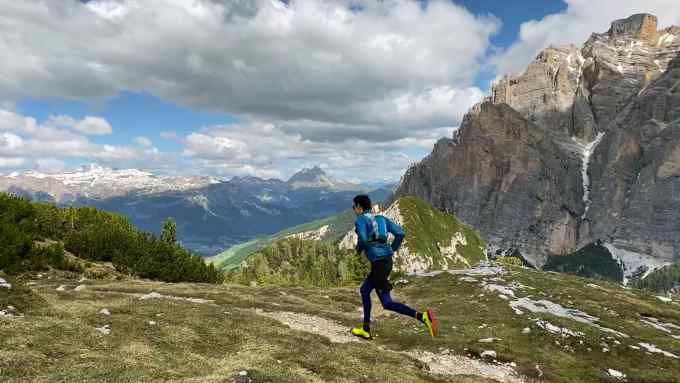 Fergus Scholes running in the Dolomites