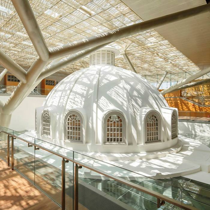 The glass ceilings bathe the grand building in natural light