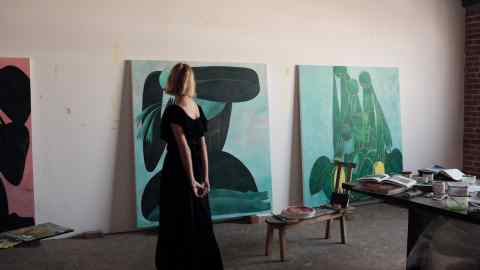 Tahnee Lonsdale at her studio in Los Angeles with (left) Dove, 2022, and As Above, 2022
