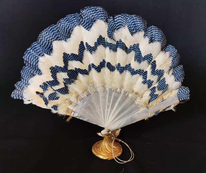 A c1910 mother-of-pearl and jay feather fan from the collection of Gert-Jan van Veghel