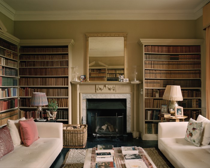 The library sofas and ottoman are from Caravane