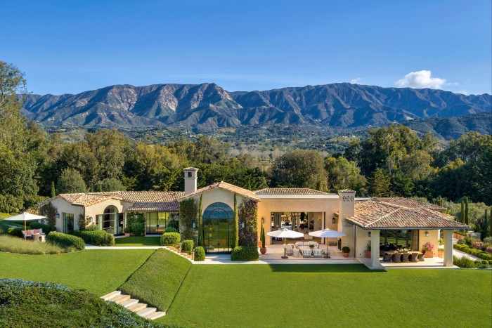A large Spanish-style single-storey house set in landscaped gardens with the Santa Ynez mountains in the background, $55mn